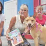 Adopted dog inspires happy tale