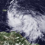 Large Tropical Storm Isaac strengthening