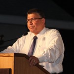 Premier backs down