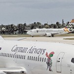 Cayman Airways board members fly for free