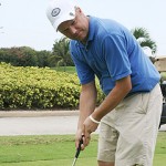 Dodson putts in a charge to the hole