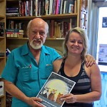 Author donates books to Humane Society