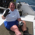 Amputee finds camaraderie, pain relief through diving