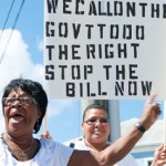 Protesters pan immigration bill, government