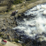 Dump burns for second day