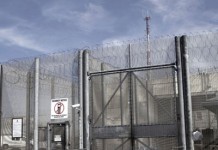 Fired prisons officer sues