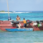 Another packed Cuban boat floats through