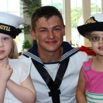 Warship sailors visit preschoolers