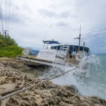 Two party boats wash ashore