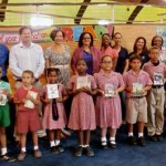 Kids' books donated to libraries, schools