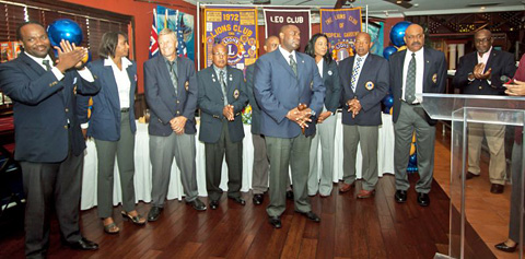 Celebrating the changeover of the Lions board are, from left, immediate past president Rayle Roberts, two-year director Carmin Godfrey, two-year director Steve Surrey, one-year director Lynval Watkins