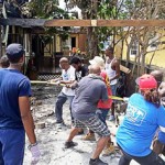 Family routed by fire wants to rebuild compound