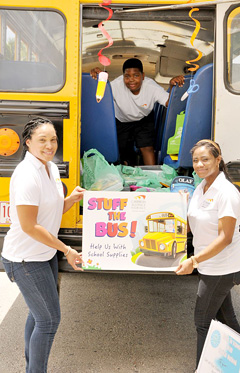 Pictured here manning the donation table are, from left, Aleisha Lalor, Jaylan Samuels and Chanelle Ramoon. 