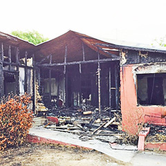 The home Jake Manderson shared with his mother and brother in Bodden Town was destroyed by fire last month.