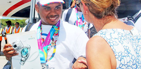 Mark Ebanks was greeted by Governor Helen Kilpatrick.