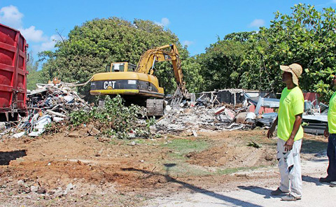 The burned-out building was torn down and the rubble carted away.
