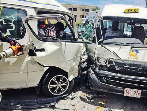 Both drivers were injured in Friday afternoon’s crash on the George Town waterfront. – Photo: Taneos Ramsay