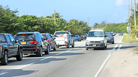 Traffic stacks up on the Linford Pierson Highway. The National Roads Authority recently repaired a section of the road that was buckling under the weight of too many vehicles on a daily basis.