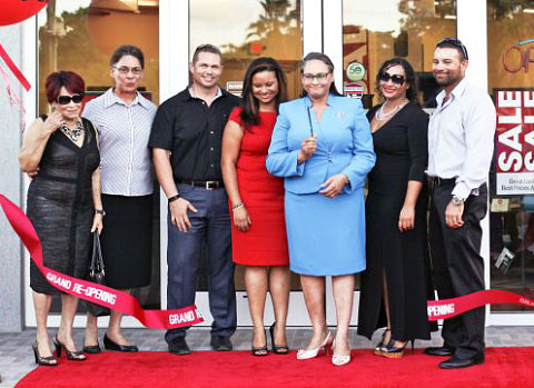 Jacqui Tomlinson-Smith, third from right, cuts the ribbon 