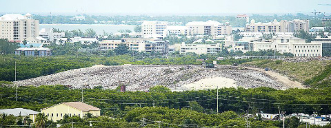 The most recent report presents an assessment of contaminants and other hazards associated with the George Town landfill, pictured, and dump sites in Cayman Brac and Little Cayman. 