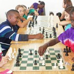 Young chess players learn the moves