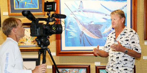 Filmmaker George Schellenger talks to Guy Harvey at his George Town gallery