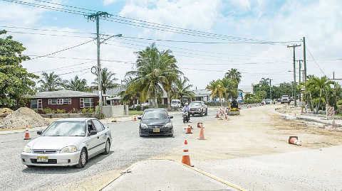 Traffic maneuvers through the roadwork on Smith Road, which is scheduled to continue until the end of October. - PHOTO: TANEOS RAMSAY