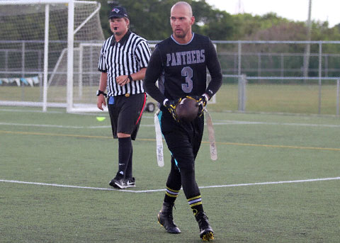 Simon Rivers kicks for the Panthers.