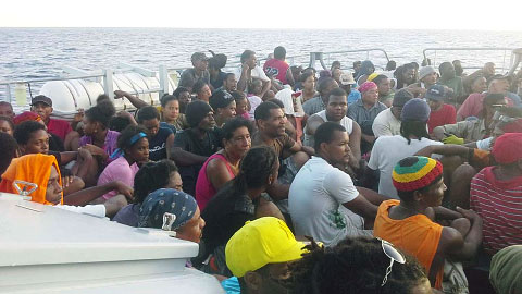 Residents of Petite Savanne by sea on Dominica