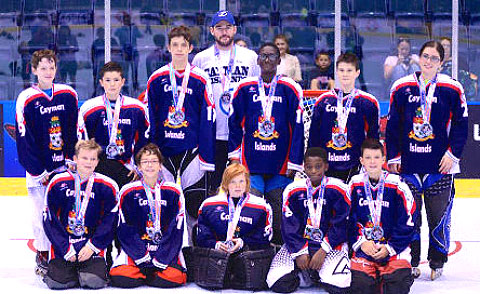 Silver winners, 12u, back from left, Justin Hastings, Noah Booker, Ethan Finlason, Dennis Passchier (coach), Jabari Warlord, Ryan Godwin, Sadie Finch. Front, Jayden Mannisto, Nik McCallum, Nate Hughes