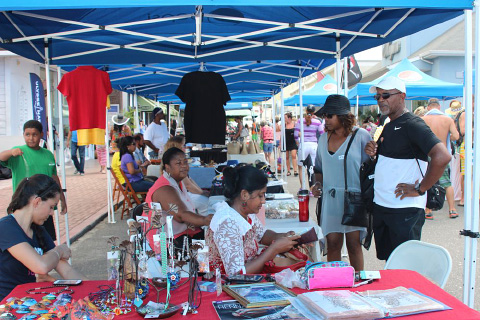 Visitors check out some arts and crafts.