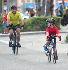 Tim Dailey is introducing his son Alex to the joys of cycling.