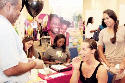 Katie Russell gives a swab for the bone marrow data bank.