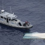 38-foot boat capsizes off West Bay