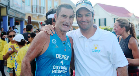 Hospice chairman Chris Duggan, right, congratulates Derek Haines after his marathon fundraising effort for the new facility. - Photo: Ron Shillingford