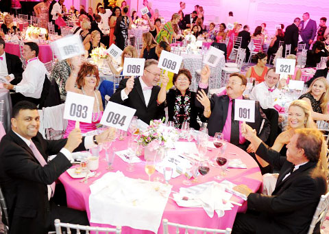 The live auction portion of the Breast Cancer Gala Dinner raised more than $90,000. - Photos: Melissa Wolfe