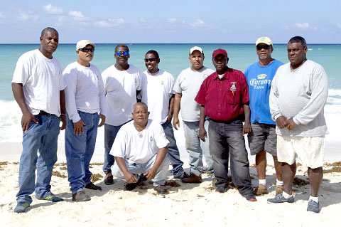 A government beach clean-up crew removed huge mats of seaweed Friday morning, but more was quickly washed ashore. - Photo: Kelsey Jukam