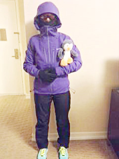 Teresa Strad tries on the protective gear she will have to wear when she competes in a half-marathon in Antarctica in November.
