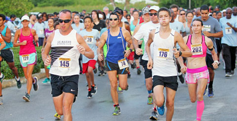 More than 200 runners entered the Credit Union 5K. - PHOTOS: RON SHILLINGFORD