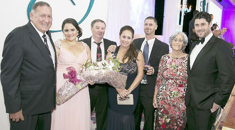 2015 YCLA recipient Kellie McGee, second from left, with her family, from left, Albert Hislop, Owen McGee, Ruth McGee, Ryan McGee, Sallie Hislop and Jamie McGee.