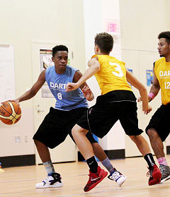 Deontae Andrews of the John Gray Knights takes on two Kings players.