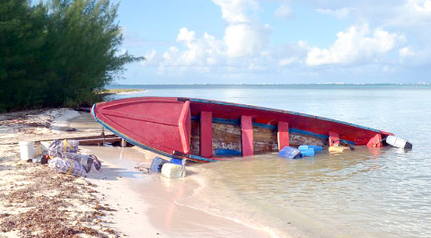 The canoe involved in the police marine pursuit Sunday night in North Side was recovered. Its four passengers were not found. - Photo: RCIPS