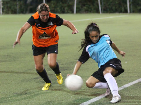Shannelle Bennett, 14, right, had a great game for Elite.