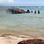 Boat goes up in flames off North Side