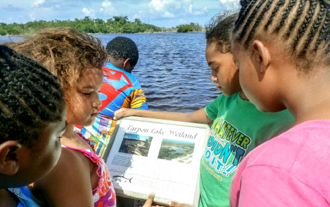 Sir John A. Cumber students learn about wildlife inhabiting the Tarpon Lake wetland.