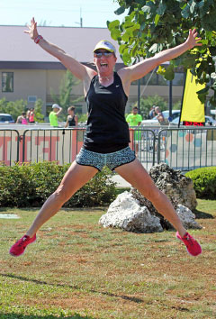 Gill Comins shows her delight at winning the women