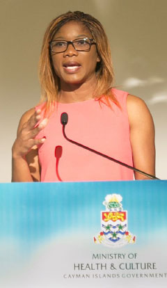 Olympian Cydonie Mothersill talks Friday at the Cayman Islands Healthcare Conference about the stem cell treatment she underwent to treat an Achilles tendon injury. - PHOTO: STEPHEN CLARKE