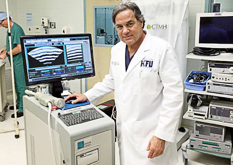 Dr. George Suarez with the Sonablate HIFU Device.