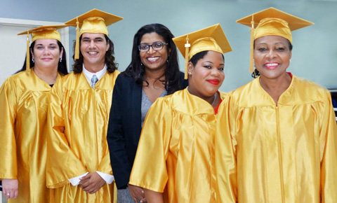 Pictured here with Chief Officer in the Portfolio of the Civil Service Gloria McField-Nixon, center, are four of the civil servants who earned certificates of public information.