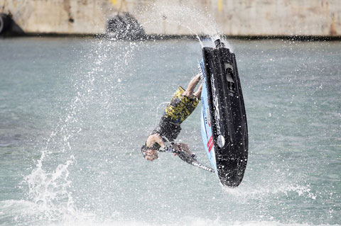 A stunt jetskier shows off his skills in the harbor. – PHOTO: STEPHEN CLARKE